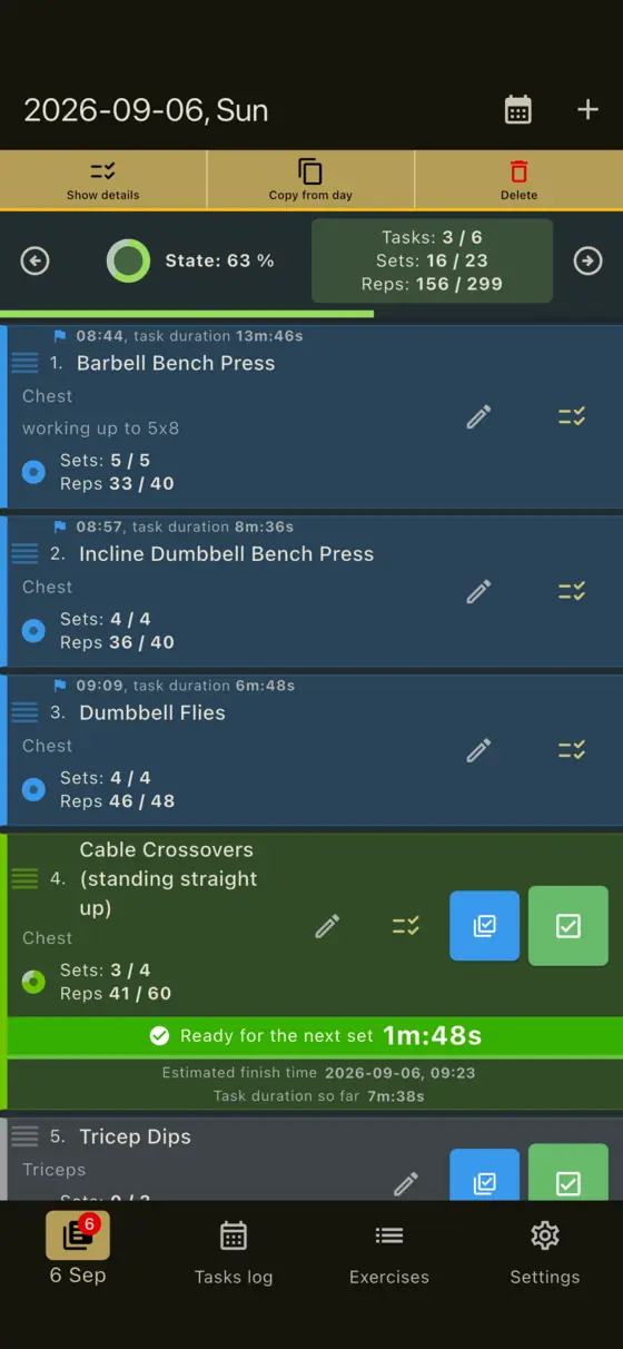 GymDid gym workout tracker in dark theme during a training session